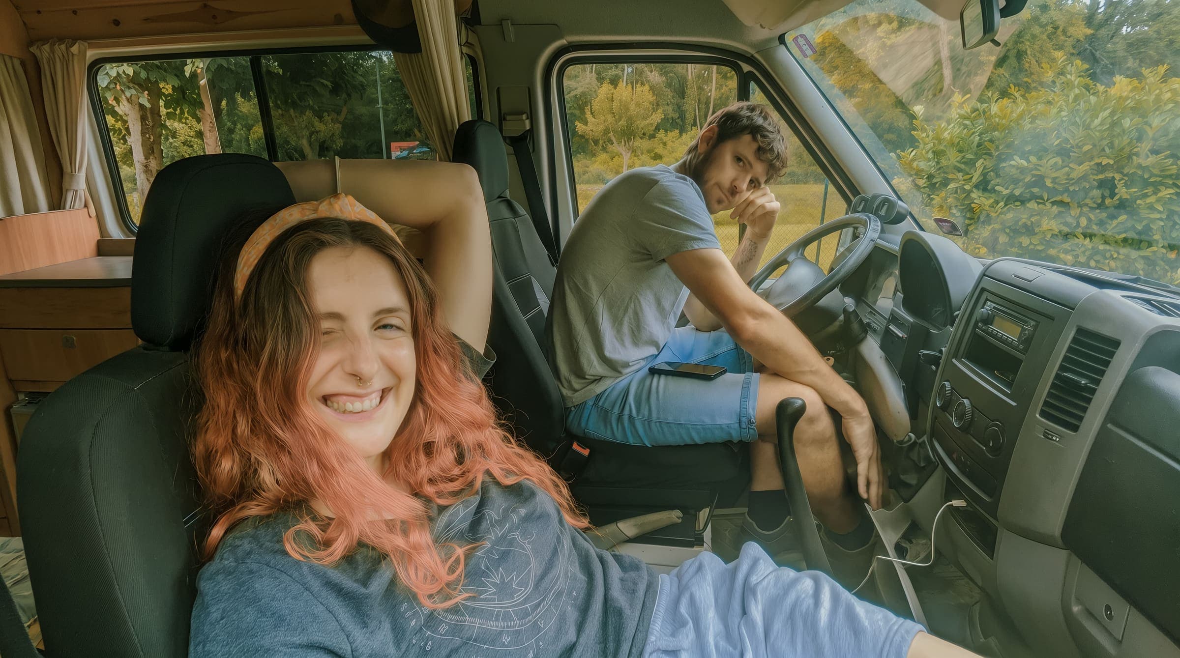 woman and man at car